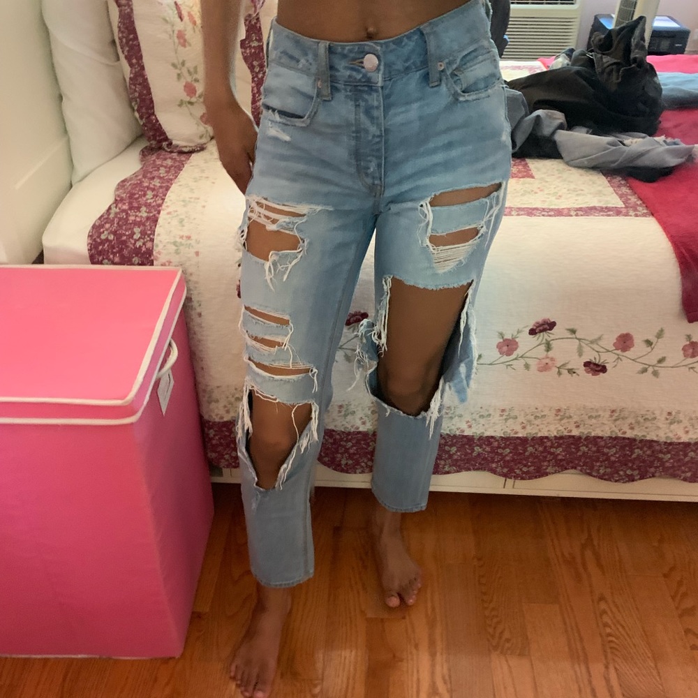 Very distressed high rise boyfriend jeans